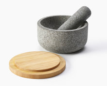 Load image into Gallery viewer, Gray stone mortar and pestle with a wooden lid on a white background