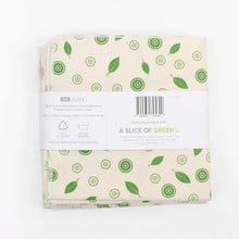 Load image into Gallery viewer, Folded fabric with green leaf pattern on a white background