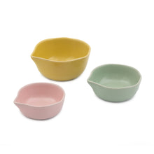 Load image into Gallery viewer, a set of three small dishes with pouring lip in yellow pink and green on a white background