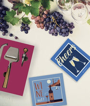 Load image into Gallery viewer, Wine-themed coasters with grapes and a cheese knife on a white surface
