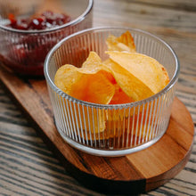 Load image into Gallery viewer, Clear glass bowl with potato chips on a wooden board
