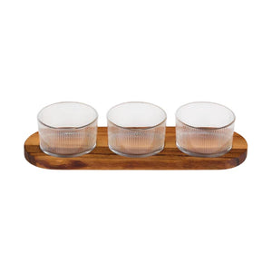 Three glass containers with a wooden tray on a white background