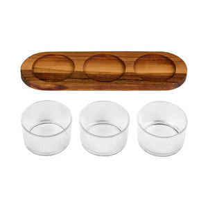 Wooden tray with three glass cups on a white background