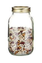 Load image into Gallery viewer, Clear glass jar with gold lid filled with mixed beans on a white background
