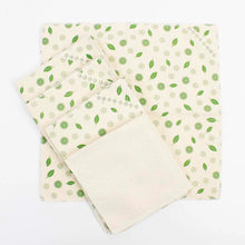 Load image into Gallery viewer, Set of green and beige patterned cloths on a white background
