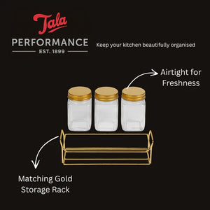 Tala jars with gold lids on a matching gold storage rack against a black background