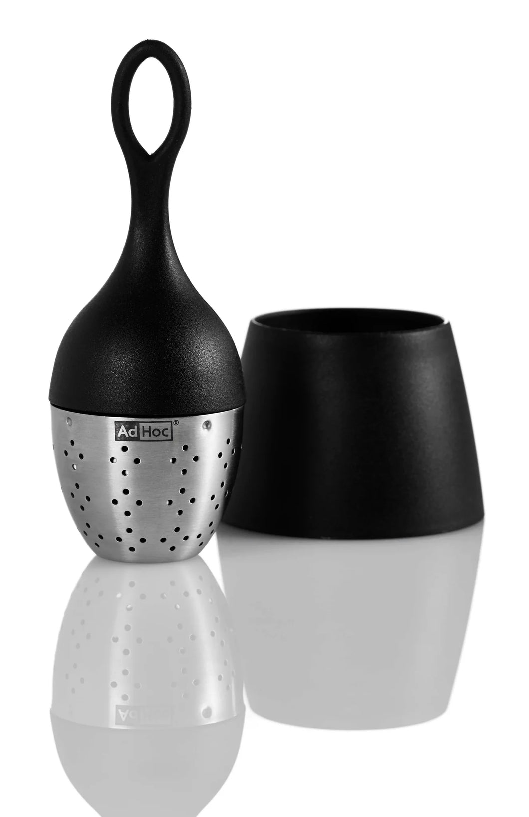 Black and silver tea infuser on a white background